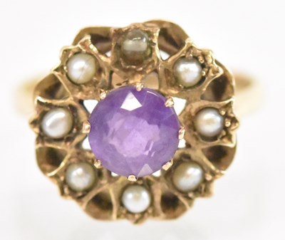 Lot 1354 - A 9ct yellow gold amethyst and seed pearl set...