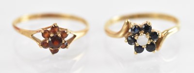 Lot 1357 - A 9ct yellow gold garnet set ring, size N, and...