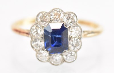 Lot 1238 - A yellow metal sapphire and diamond cluster...