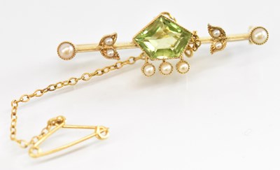 Lot 1299 - A yellow metal green stone and seed pearl set...