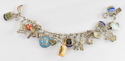 Lot 1388 - A 925 hallmarked silver charm bracelet, with a...