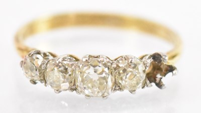 Lot 1267 - An 18ct yellow gold diamond ring, the central...