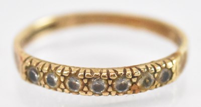 Lot 1390 - A yellow metal white stone set ring, size N,...