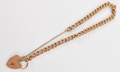 Lot 1297 - A 9ct yellow gold bracelet, with 9ct yellow...