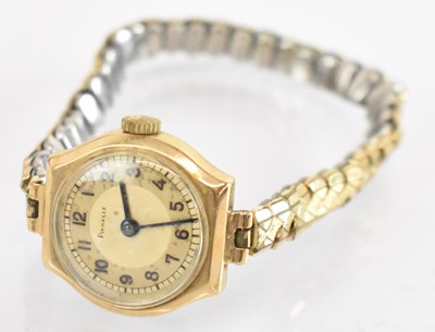 Lot 924 - A 9ct yellow gold lady's watch on stainless...