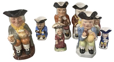 Lot 649 - A group of eight character and Toby jugs,...