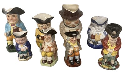 Lot 650 - A group of eight character and Toby jugs,...