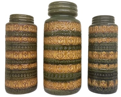 Lot 614 - A pair of West German pottery dark khaki green...