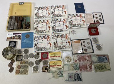 Lot 501 - A quantity of coins and banknotes to include...