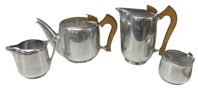 Lot 560 - PICQUOT WARE; a stainless steel four piece tea...