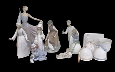 Lot 606 - LLADRÓ; a group of seven porcelain figures...