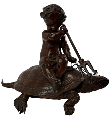 Lot 689 - A late 19th century bronze model of a cherub...