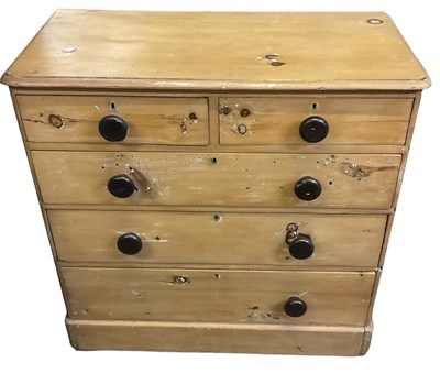 Lot 35 - A Victorian pine chest of two short over three...