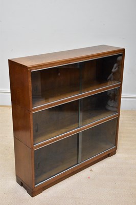 Lot 1278 - MINTY; a three section stacking bookcase,...