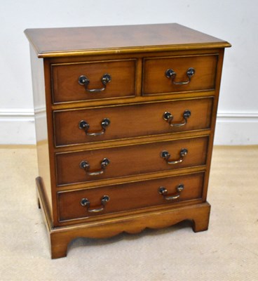 Lot 1150 - A reproduction chest of two short over three...