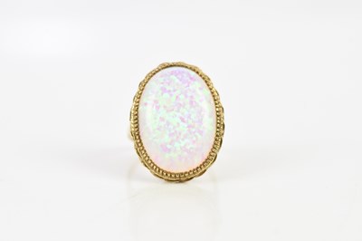 Lot 128 - A 9ct yellow gold opal dress ring, opal approx...