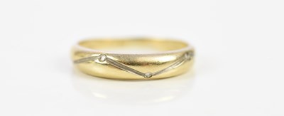 Lot 183 - A yellow metal diamond set dress ring stamped '...