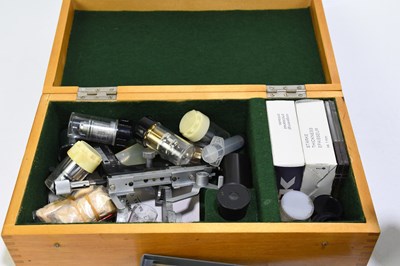 Lot 145 - An electric binocular microscope initialled GS...