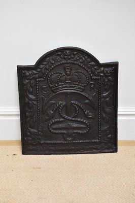 Lot 506 - A Charles I cast iron fire back, relief...