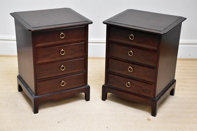 Lot 1114 - STAG MINSTREL; a pair of four drawer bedside...