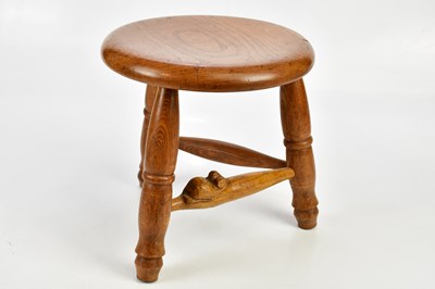 Lot 1132 - A milking stool with carved mouse.