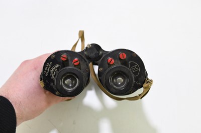 Lot 450 - A pair of WWII military issue binoculars,...