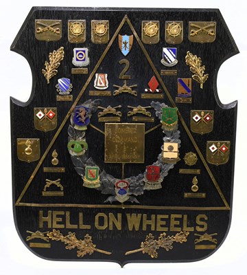 Lot 399 - HELL ON WHEELS; a stained oak plaque mounted...