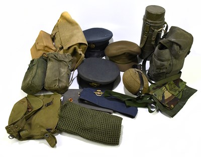 Lot 454 - A collection of military ephemera, mostly hats...