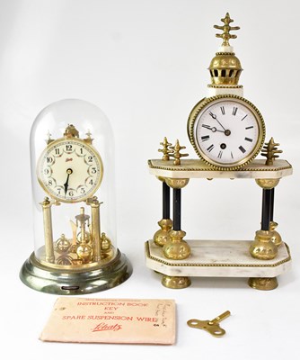 Lot 102 - A Schatz anniversary clock, the dial set with...