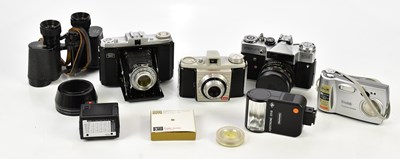 Lot 509 - A collection of film and digital cameras, to...