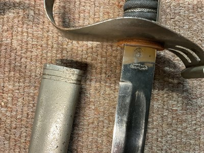 Lot 464 - A British cavalry sabre, with scabbard, with a...