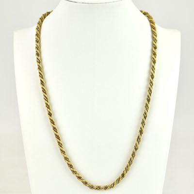 Lot 1084 - A 9ct white and yellow gold rope twist...