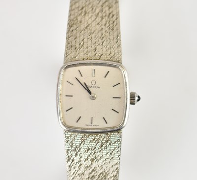 Lot 1202 - OMEGA; a ladies' 1970s vintage 9ct white gold...