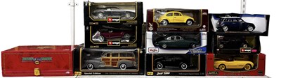 Lot 573 - A group of ten boxed large model vehicles,...