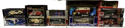 Lot 574 - A group of ten boxed large model vehicles,...