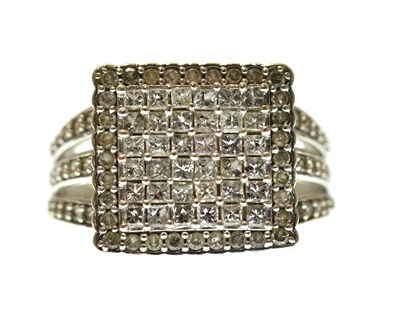 Lot 1022 - A 9ct white gold ring, the square table and...