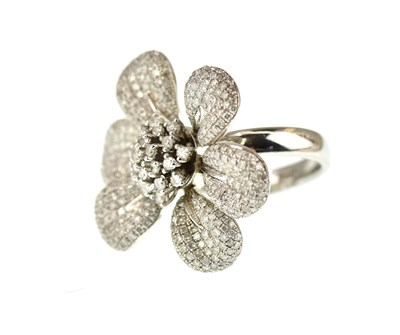 Lot 1033 - A contemporary diamond set flower head cluster...