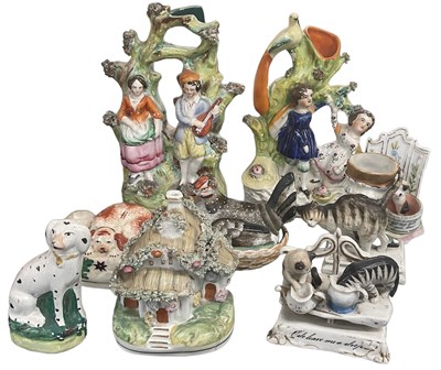 Lot 660 - A group of six Staffordshire figures including...