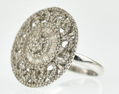 Lot 1024 - A modern 9ct gold diamond set circular cluster...