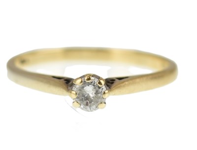 Lot 1018 - A 9ct solitaire ring with a claw set brilliant...