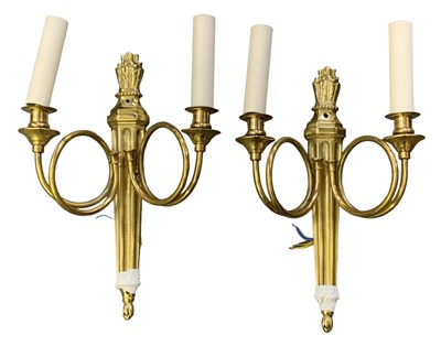 Lot 96 - A pair of brass two branch wall lights with...