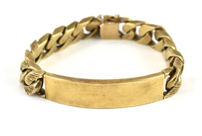 Lot 1048 - A 9ct gold identity bracelet with blank panel...