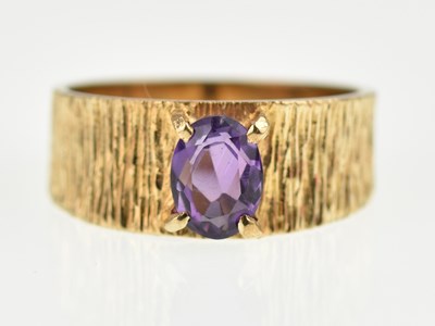 Lot 1021 - A 9ct gold 1970s amethyst set ring with...