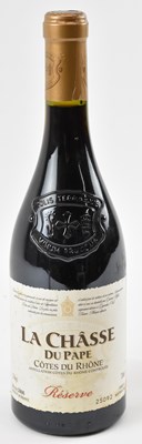 Lot 185 - RED WINE; a bottle of La Châsse du Pape Côtes...