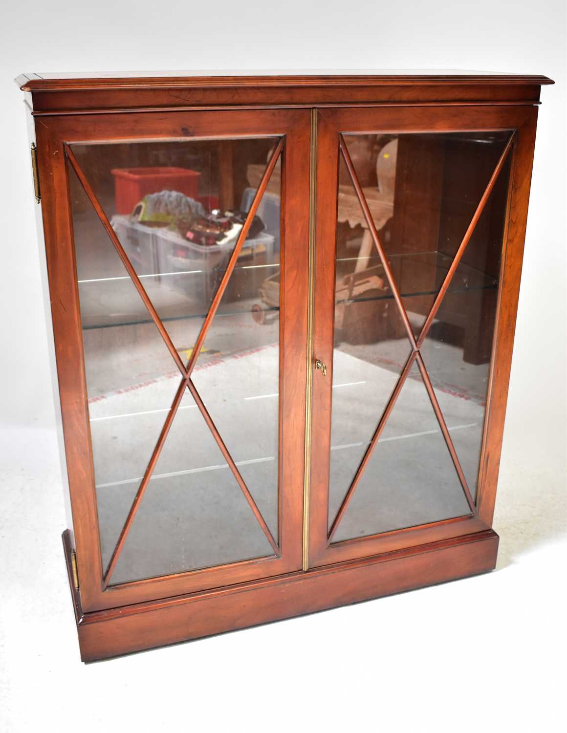 Lot 21 - An early 20th century mahogany display cabinet...
