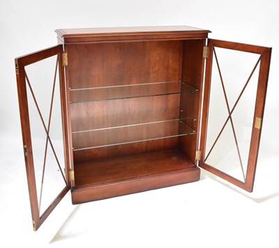 Lot 21 - An early 20th century mahogany display cabinet...