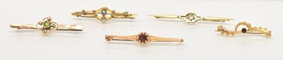 Lot 1290 - A 15ct yellow gold white stone set bar brooch,...