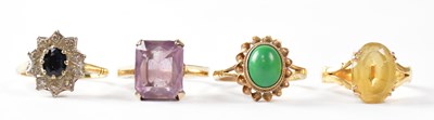 Lot 1029 - Four 9ct gold dress rings, all size P,...