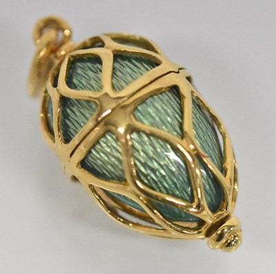 Lot 1265 - An 18ct yellow gold mounted green enamelled...