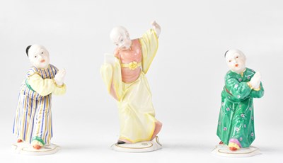Lot 253 - NYMPHENBURG; three 20th century figures of...